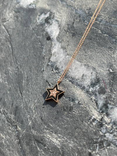 Black Star: Halskette, Stern, 18 Karat Roségold, Diamanten